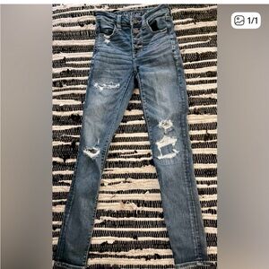 Bundle of 4: American Eagle size 00 jeans
Stylish Blue Distressed Women Jeans